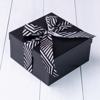 Black Cookie Gift Boxes - Celebrate with our sophisticated gift boxes from Carolina Cookie Company. Perfect for New Year, weddings, or corporate gifting.