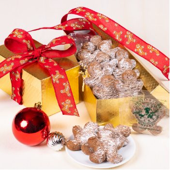 Our gold gingerbread cookie box is packed with up to 2 dozen of our mouthwatering gingerbread cookie men dusted with powdered sugar and individually wrapped.