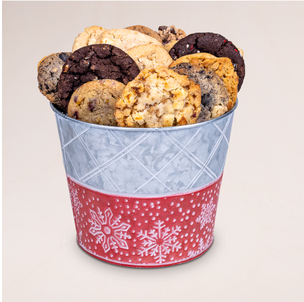 This metal snowflake Christmas cookie bucket features 18 delectables in your choice of flavor or specially curated assortment.