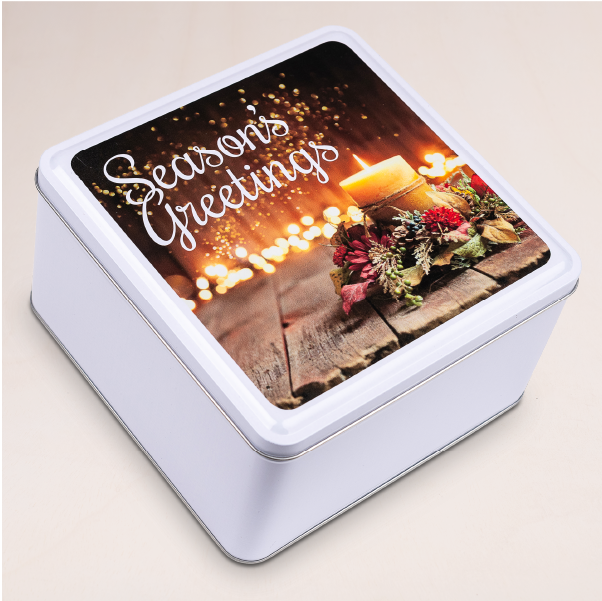 Our Season's Greetings Christmas cookie gift tins feature up to 2 dozen gourmet cookies in your favorite flavor or choice of specially curated assortment and is perfect for treating your family, friends, co-workers or even yourself.