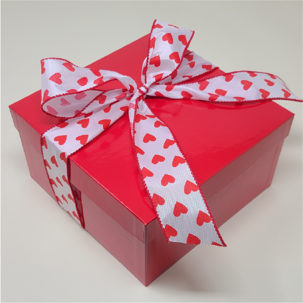 A beautiful heart ribbon ties this cheery red Valentine cookie box with up to 3 dozen of our delicious gourmet cookies in a favorite flavor or choice of assortment.